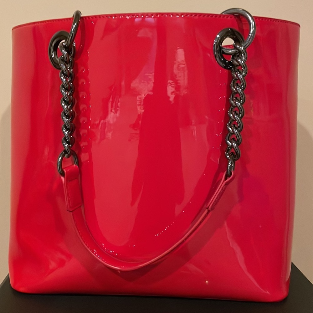 I am selling my beautiful Red DKNY handbag